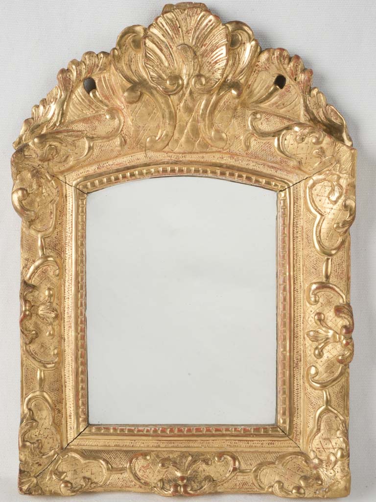 Exquisite antique giltwood mirror